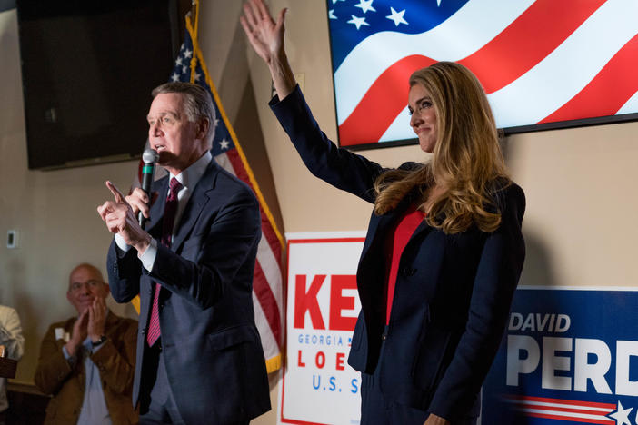Sens. David Perdue and Kelly Loeffler speak at a campaign event this month at a restaurant in Cumming, Ga. Both are competing in runoff elections in January that will determine which party controls the Senate.