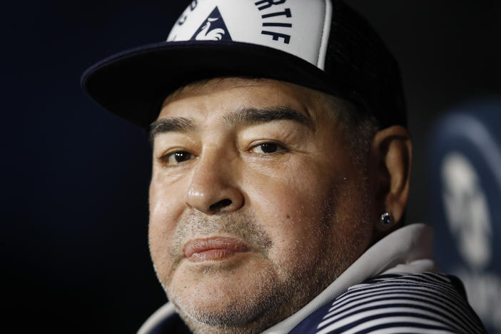 Diego Maradona, coach of Gimnasia y Esgrima, sits on the bench prior to Argentina's soccer league match against Boca Juniors at La Bombonera stadium in Buenos Aires, Argentina, in March.