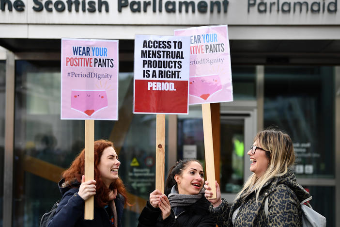 Activists rally outside the Scottish Parliament in Edinburgh in February in support of legislation for free period products. Scotland will make these products free to all who need them after lawmakers unanimously passed a bill that will require tampons and pads to be available in public places.