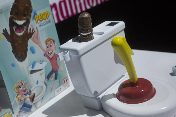 <strong>G.I. Woe:</strong> Mattel's Flushin' Frenzy sends a brown plastic poop flying into the air. It's pictured above at Toy Fair in New York in February 2018.