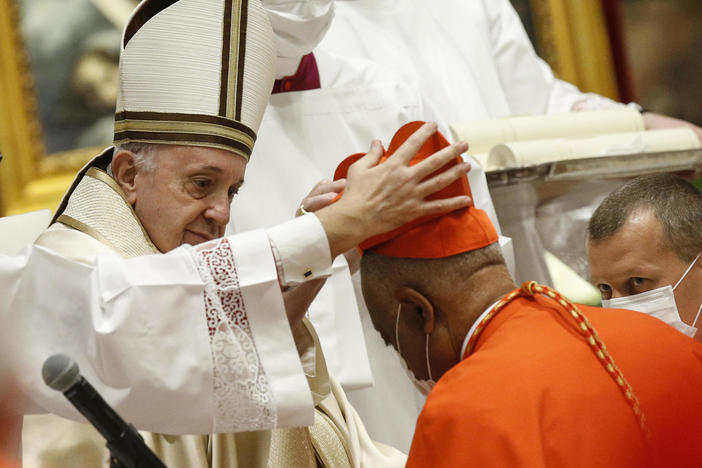 Archbishop Wilton Gregory of Washington, D.C., becomes a cardinal during a ceremony Saturday known as a consistory in St. Peter's Basilica at the Vatican. Pope Francis cautioned new cardinals never to lose their connection to the people.