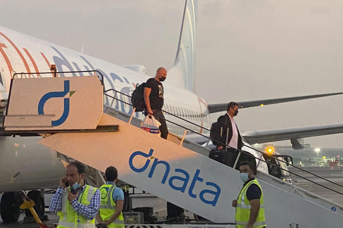 Israeli tourists deplane from a FlyDubai flight from Tel Aviv to Dubai, on Nov. 28.