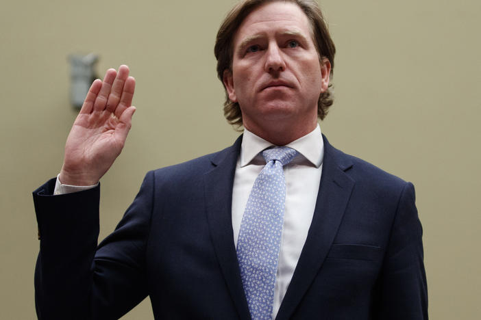 Christopher Krebs, recently ousted as director of the Department of Homeland Security's Cybersecurity and Infrastructure Security Agency, is sworn in to testify last year on Capitol Hill.