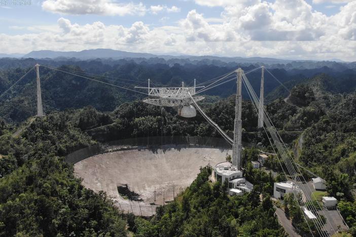 The Arecibo Observatory's mammoth telescope collapsed overnight. It's seen here in November, after a cable damaged its dish.