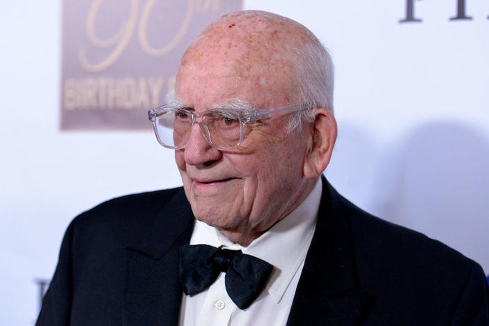 Ed Asner and nine other actors have filed an age discrimination suit over changes to the SAG-AFTRA union's health plan.