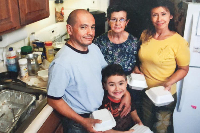 The Muñoz family (from left: Jorge, Justin, Blanca and Luz) prepares meals from their kitchen in 2010.
