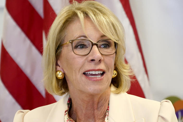 Education Secretary Betsy DeVos appears in Phoenix in October. On Friday, the Education Department announced an extension of pandemic relief measures for federal student loan borrowers.