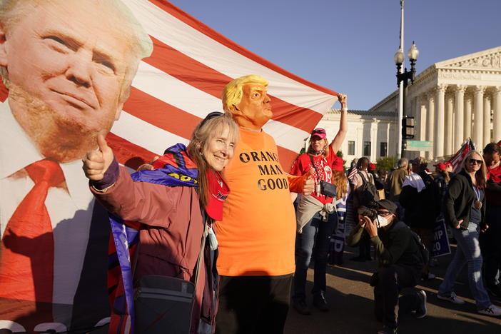Supporters of President Trump attend pro-Trump marches outside the Supreme Court in Washington on Nov. 14. The Trump team was dealt several losses in multiple courts Friday.