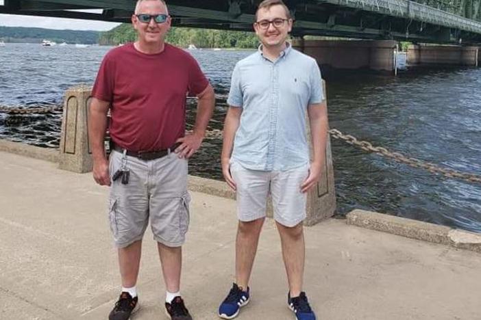 Tyler Skluzacek (right) helped develop a smartwatch app to help disrupt his father Patrick's nightmares. The app recently won approval from the Food and Drug Administration.