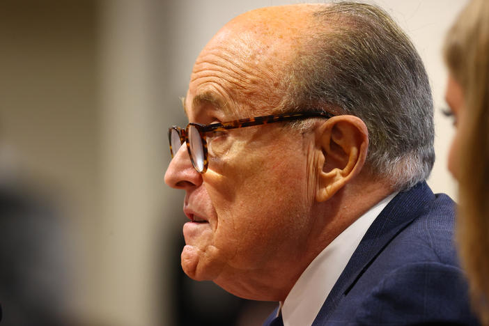 President Trump's personal attorney Rudy Giuliani speaks during an appearance last week before the Michigan House Oversight Committee in Lansing. Days later, it was revealed he had tested positive for the coronavirus.