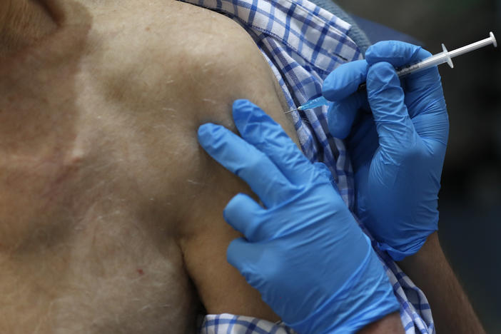The U.K. launched its largest-ever immunization program Tuesday. Health officials began dispensing doses of the Pfizer and BioNTech coronavirus vaccine, first vaccinating health care workers and residents over the age of 80.