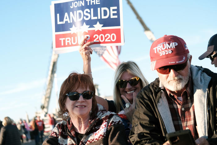 Supporters arrive for a President Trump rally in Valdosta, Ga., last weekend. Fewer than half of Trump backers said they would get the COVID-19 vaccine in a new poll.