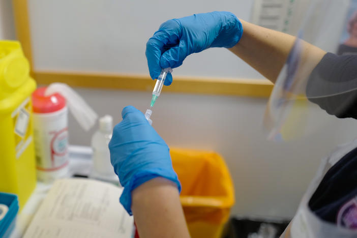 Health regulators in the U.K. warned people with severe allergies not to get the new coronavirus vaccine after two medical staffers came down with severe reactions.