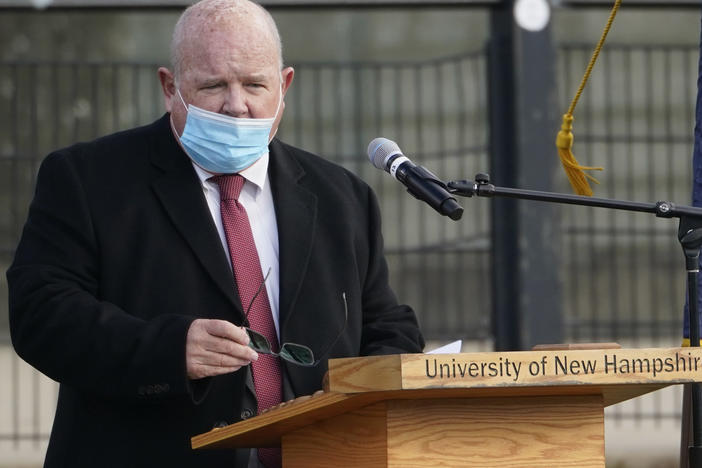 New Hampshire House Speaker Dick Hinch speaks on Dec. 2 during an outdoor legislative session at the University of New Hampshire in Durham, N.H. Hinch died of COVID-19 on Dec. 9, just a week after he was sworn in as leader of the state's newly Republican-led House. He was 71.