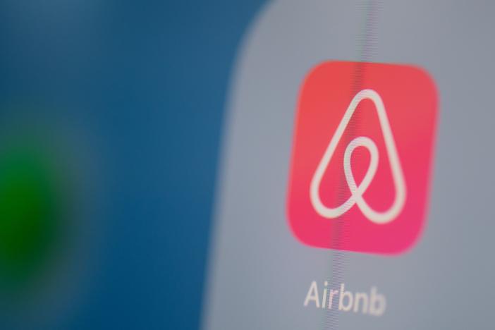 Airbnb is listing shares of its initial public offering Thursday, capping a tumultuous year for the short-term rental company.