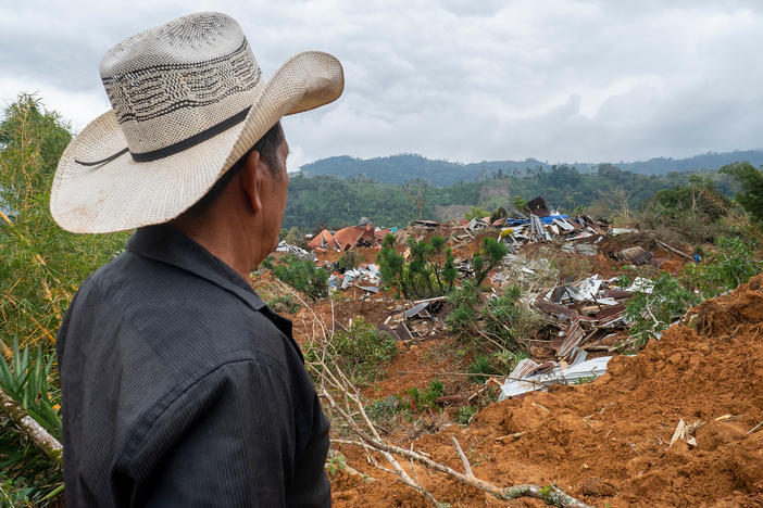 Two hurricanes destroyed bridges, roads, schools, health clinics and homes. Here is the aftermath in Protección in Honduras' Santa Barbara department on Dec. 11.