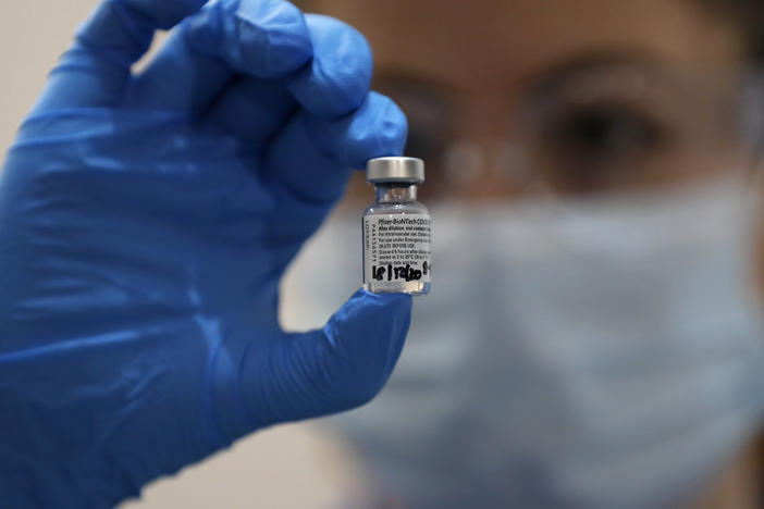 Pfizer-BioNTech's COVID-19 vaccine has been tested for safety and efficacy in more than 44,000 people. Still, stopping viral spread will take more than immunizations, says the CDC. The agency is calling for those who are vaccinated to continue wearing masks and practicing safe physical distancing.