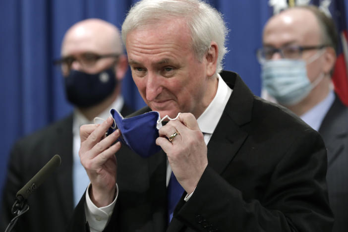 Deputy Attorney General Jeffrey A. Rosen addressed a press conference at the Justice Department in October. He'll now run the show there until the arrival of the incoming Biden administration.
