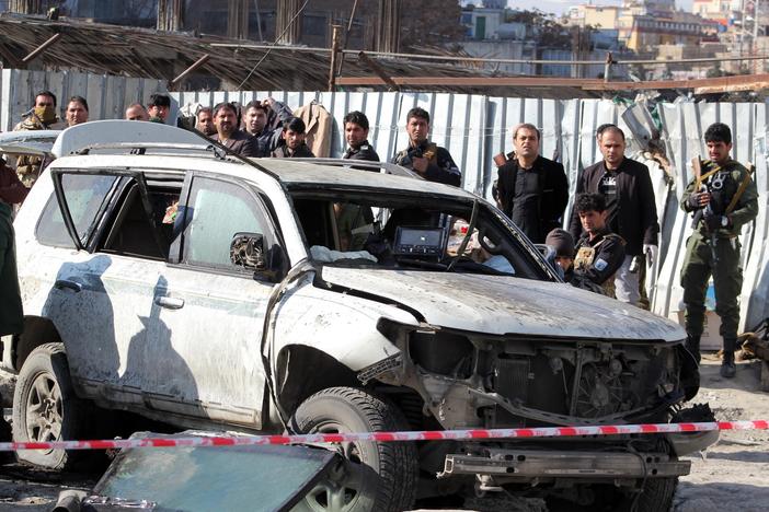 A view at the scene where Deputy Governor of Kabul Mahbubullah Muhibbi was killed in a bomb blast, in Kabul, Afghanistan, on Tuesday.