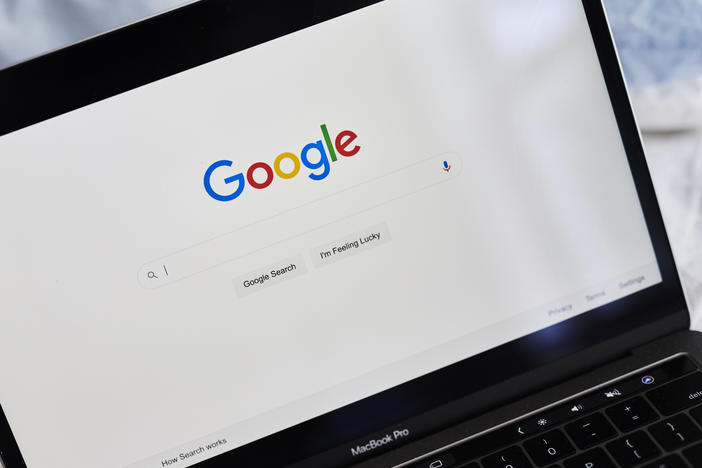 Google's search page is displayed on a laptop in an arranged photograph taken in New York on July 24. The tech giant was hit by a lawsuit from 38 attorneys general on Thursday, the third major legal challenge against Google in two months.
