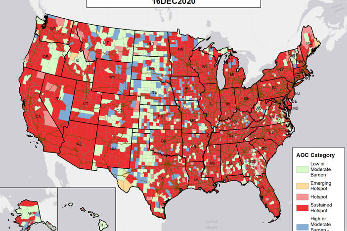 This map highlights what the government considers areas of concern around the country. Red counties are "sustained hotspots," with high sustained coronavirus caseloads and higher risk of health care capacity issues.