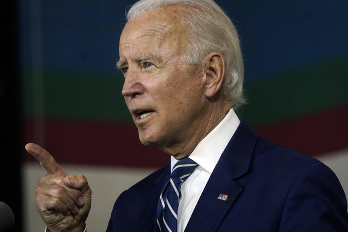 Joe Biden speaks about economic recovery during a campaign event at Colonial Early Education Program at the Colwyck Center in July. In an interview with Stephen Colbert, the president-elect defended his son Hunter, whose tax affairs are under investigation.