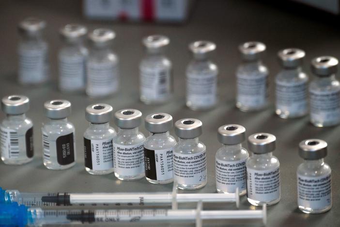 "Pfizer is not having any production issues with our COVID-19 vaccine," CEO Albert Bourla says. But Health and Human Services Secretary Alex Azar says the company has had problems. Many states say their allocations for next week have been cut without an explanation.