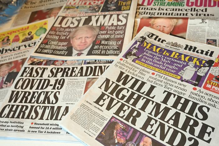 An arrangement of U.K. daily newspapers shows front page headlines reporting on the tight new coronavirus restrictions for London and the southeast of England, cancelling Christmas gatherings for those in the new "Tier 4" category.