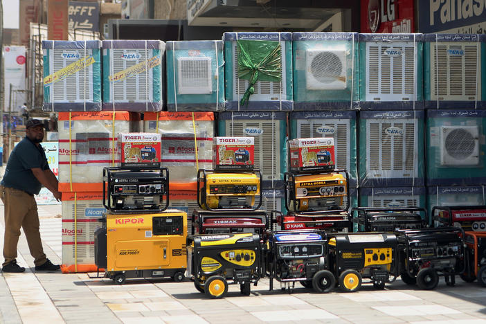 Air conditioners on display in Baghdad. Congress' coronavirus relief package will also reduce the use of hydrofluorocarbons, putting the U.S. in line with an international agreement to fight climate change.