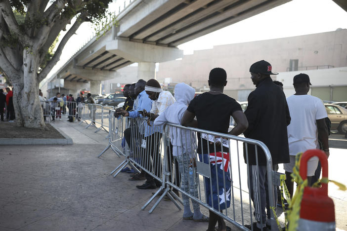 Migrants from Haiti, Africa, and Central America wait to see if their number will be called to cross the border and apply for asylum in the United States, at the El Chaparral border crossing in Tijuana, Mexico, in September 2019.