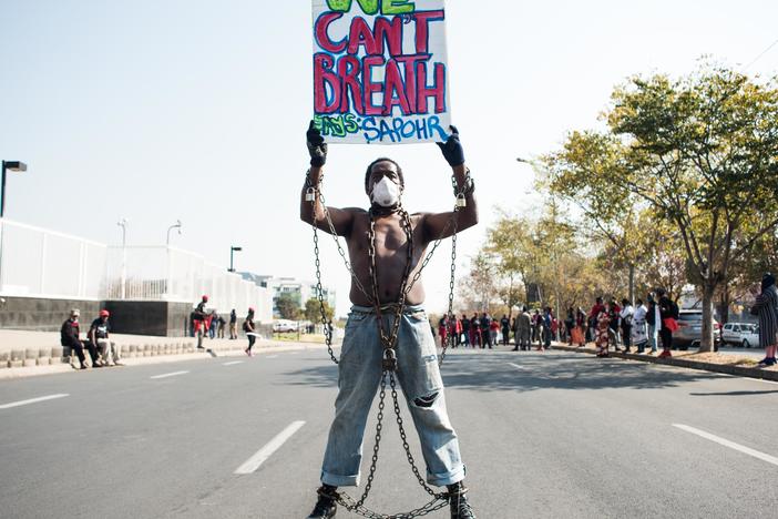 Members of Economic Freedom Fighters (EFF) protest against the death of George Floyd outside U.S. Consulate in solidarity with Black Lives Matter movement on June 8, 2020 in Sandton, South Africa.