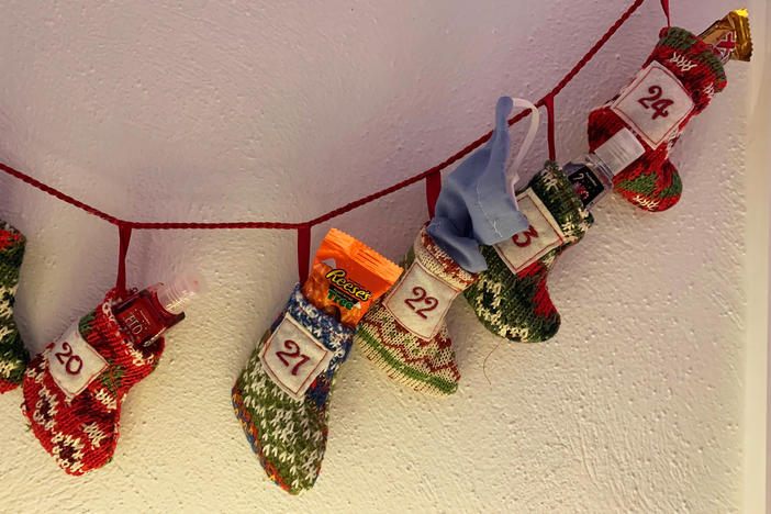 Kathleen Murray gave family members Advent calendars that, alongside candy, included hand sanitizer and masks. "It's the closest thing to safety that you can give them," she said.