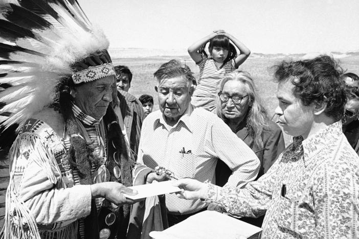 Hank Adams, right, died Dec. 21 at the age of 77. Adams fought for Native American treaty rights throughout his life.