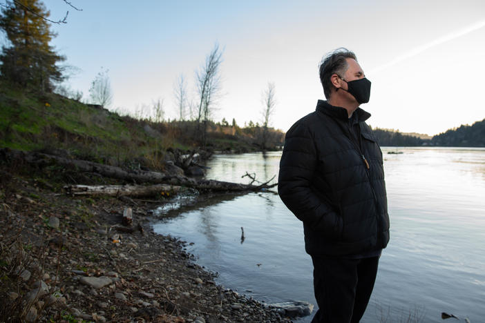Joel McLemore of Milwaukie, Ore., looks at the Willamette River near his home in suburban Portland, Ore. McLemore moved to Oregon in April to pursue new employment opportunities after his divorce.