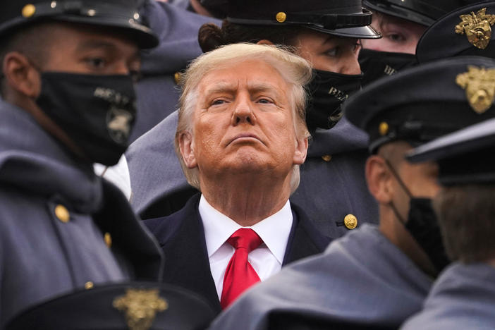 Surrounded by Army cadets, President Trump watches the Army-Navy football game at the U.S. Military Academy in West Point, N.Y., on Dec. 12.