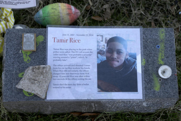 The Justice Department announced Tuesday it would not bring federal criminal charges against two Cleveland police officers in the 2014 killing of 12-year-old Tamir Rice (pictured in a memorial).