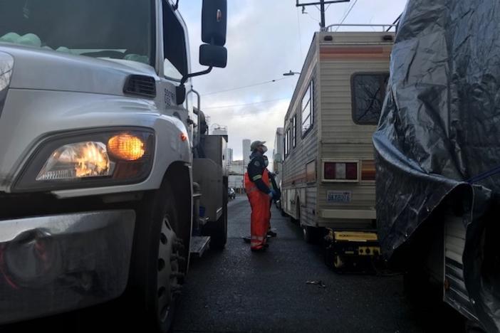 As RV Wastewater Pilot Program coordinator for Seattle Public Utilities, Chris Wilkerson visits people living in motor homes and trailers and offers to pump out their waste for free.