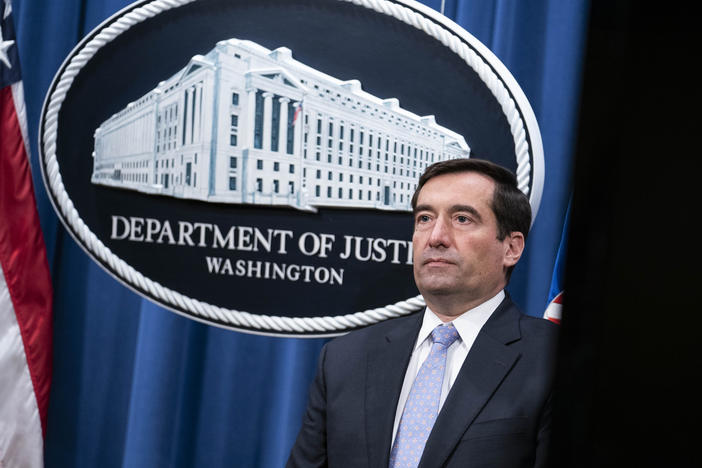 Assistant Attorney General for National Security John Demers listens during a virtual news conference at the Department of Justice on Oct. 28, 2020.