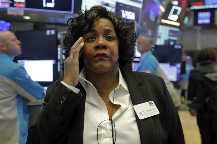 Yvette Arrington with the New York Stock Exchange trading floor operations watches the market slide on March 9 as coronavirus fears grip the financial markets.