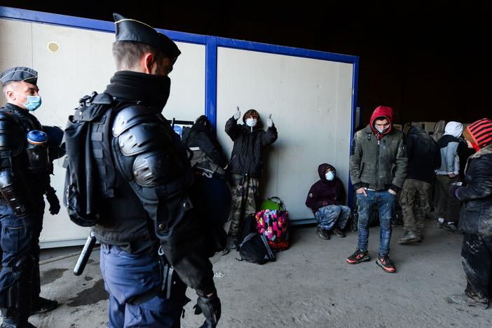 Police break up a rave in Lieuron in northwestern France. Some 2,500 partygoers attended an illegal New Year rave, violently clashing with police who failed to stop it and sparking concern the underground event could spread the coronavirus.