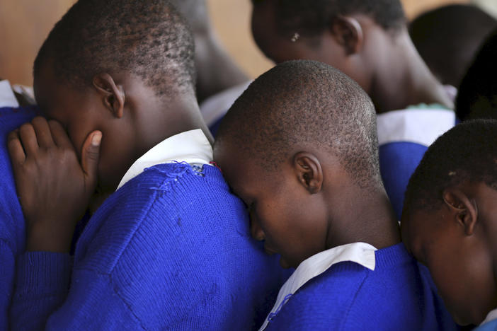 Students rehearse a poem that they will recite at an event advocating against female genital mutilation at the Imbirikani Girls High School in Kenya.