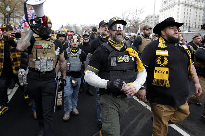 Demonstrators wearing clothes linked to the far-right extremist group  Proud Boys attend a pro-Trump rally in Washington last month.