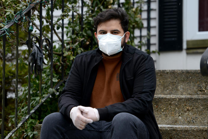 Carlos Reyes, a certified nursing assistant in Massachusetts, says the nursing homes where he works told him he could not get vaccinated because he is a contract worker. He has since tested positive for the coronavirus.