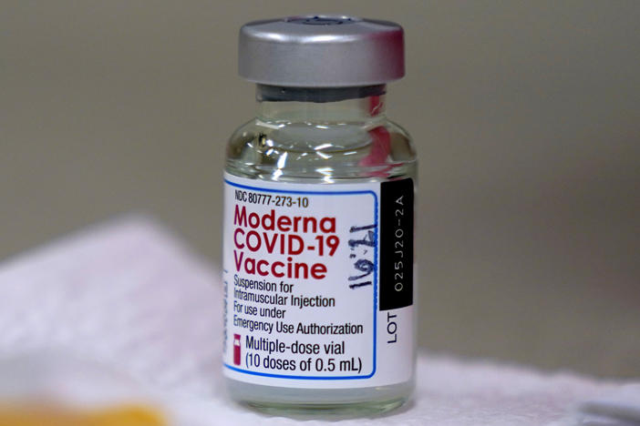 A bottle of Moderna's COVID-19 vaccine is shown before being used last month in Topeka, Kan. The European Medicines Agency has recommended authorizing the drug on a conditional basis.