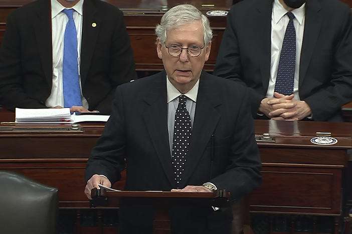 Senate Majority Leader Mitch McConnell of Kentucky speaks on the Senate floor as the Senate reconvened after a mob stormed into the U.S. Capitol on Wednesday.