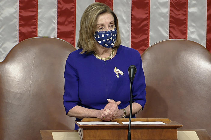 House Speaker Nancy Pelosi, D-Calif., speaks as the House reconvenes after protesters stormed into the U.S. Capitol.