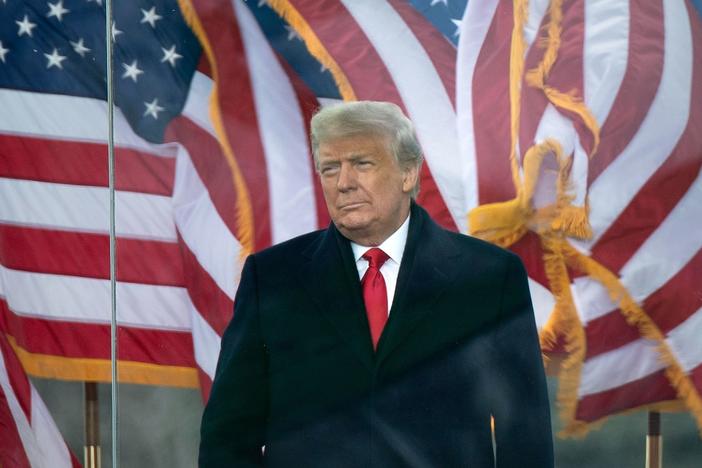 President Trump arrives to speak to supporters near the White House on Wednesday.