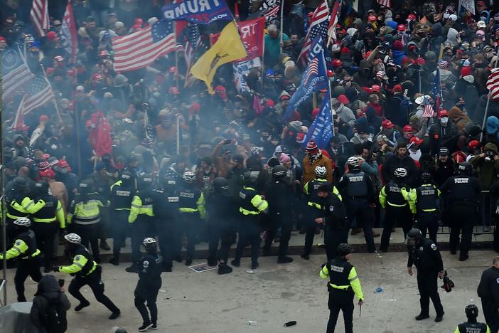 Police hold back supporters of Donald Trump as they gather outside the U.S. Capitol on January 6, 2021, in Washington, DC.