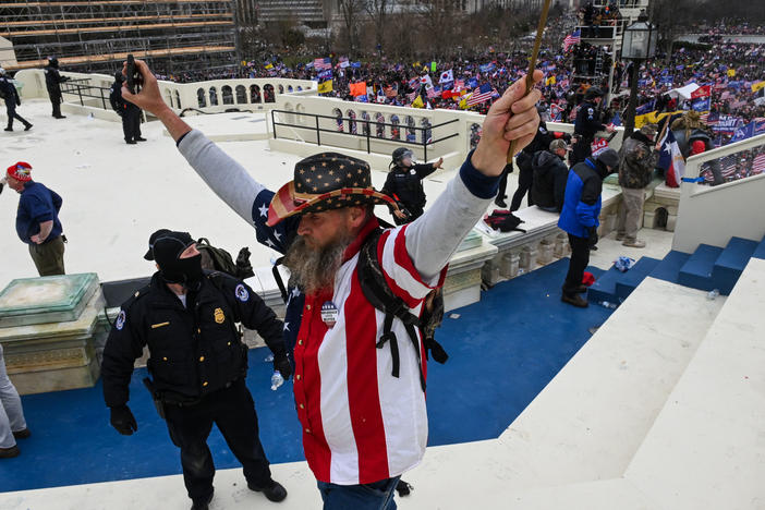 Trump supporters clash with police and security forces as they invade the U.S. Capitol on Wednesday.