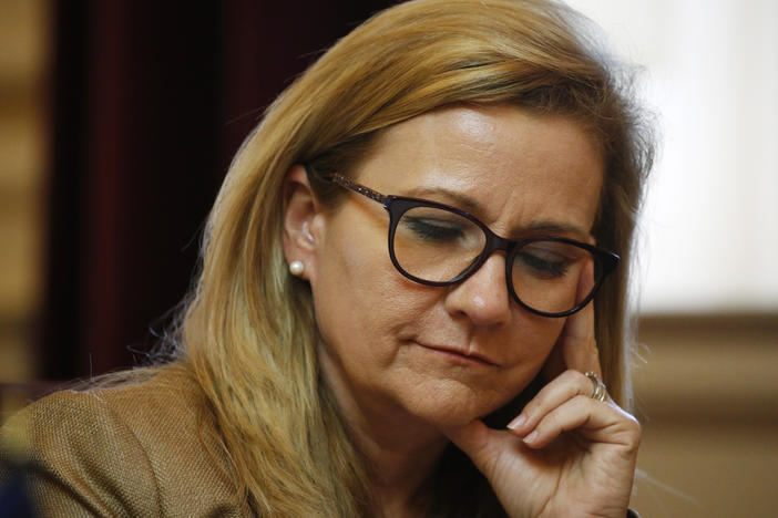 Virginia state Sen. Amanda Chase, a Republican, listens to debate during the Senate session at the Capitol Wednesday, Feb. 26, 2020, in Richmond, Va. Chase attended the rally in Washington, D.C., in which rioters pushed their way into the U.S. Capitol.